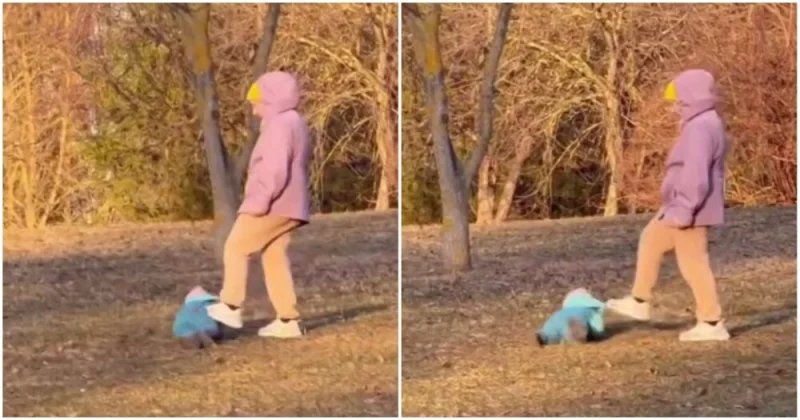 Мама-футболистка? В Минске женщина «прокатила» сына ногами по асфальту, и ему понравилось