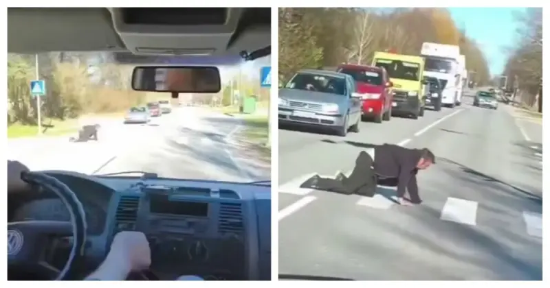 Латыш переползает дорогу: курьезное видео из Латвии Латвия, пьяный, пешеход, переход, курьез, видео, прикол